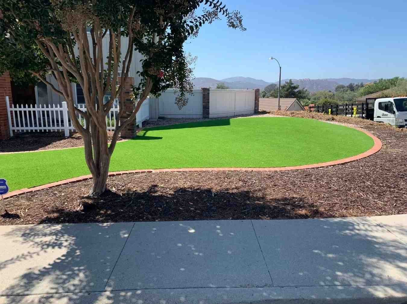 Backyard turf installation with patio